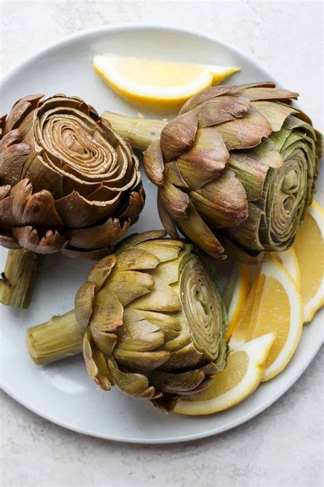 What is the proper way to cook an artichoke?